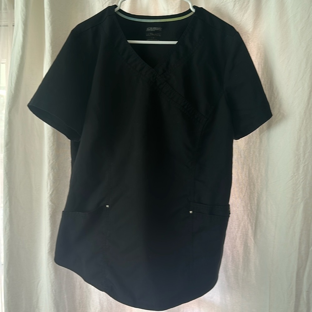Black SCRUBSTAR scrub top.